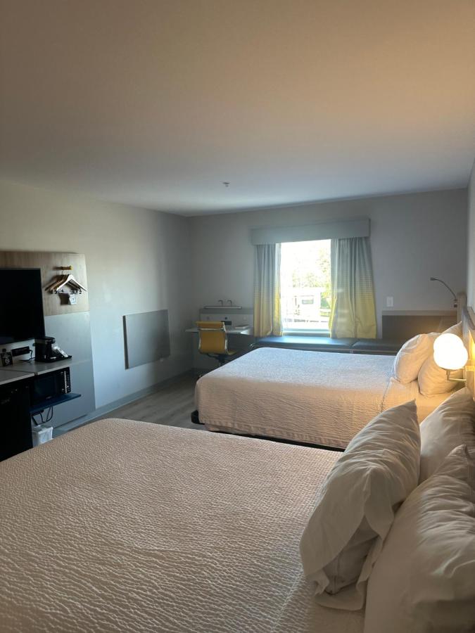 Corner Queen Room with Two Queen Beds - Non-Smoking at Microtel Inn & Suites by Wyndham Hot Springs