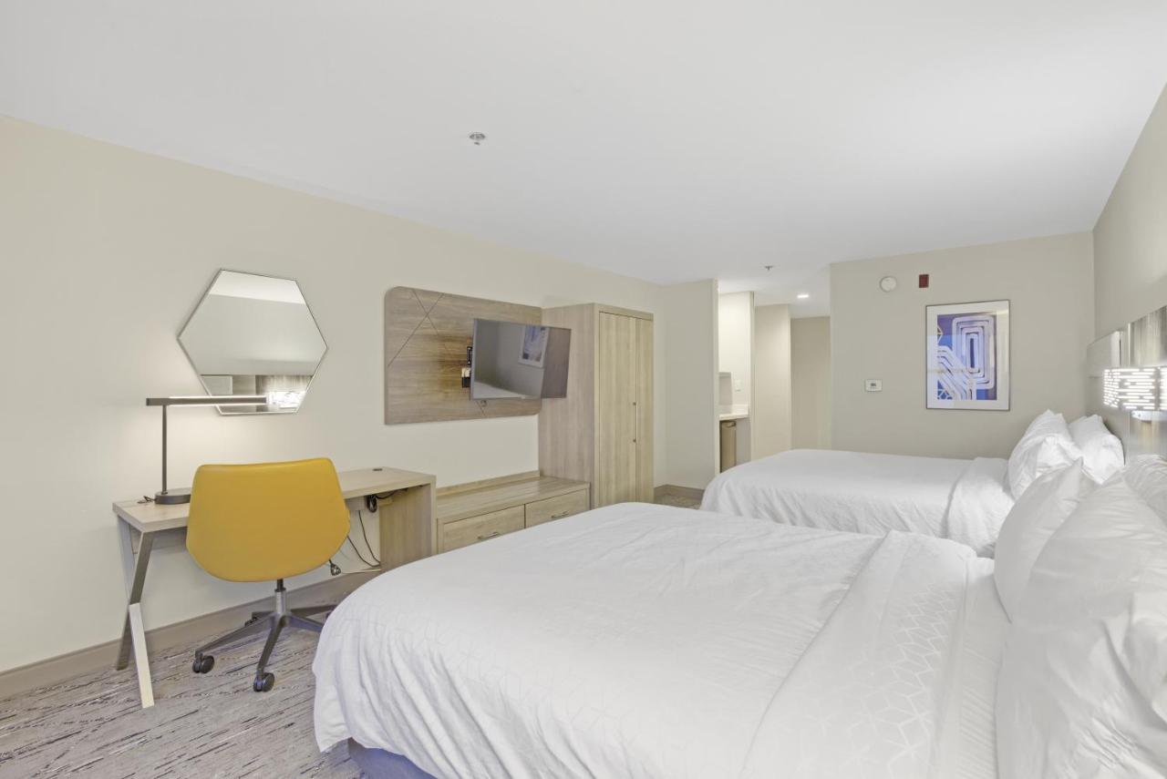 Queen Room with Two Queen Beds and Partial Ocean View - Hearing Accessible/Non-Smoking at Holiday Inn Express Gulfport Beach by IHG
