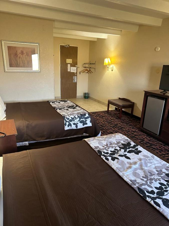 Queen Room with Two Queen Beds - Non-Smoking at Executive inn