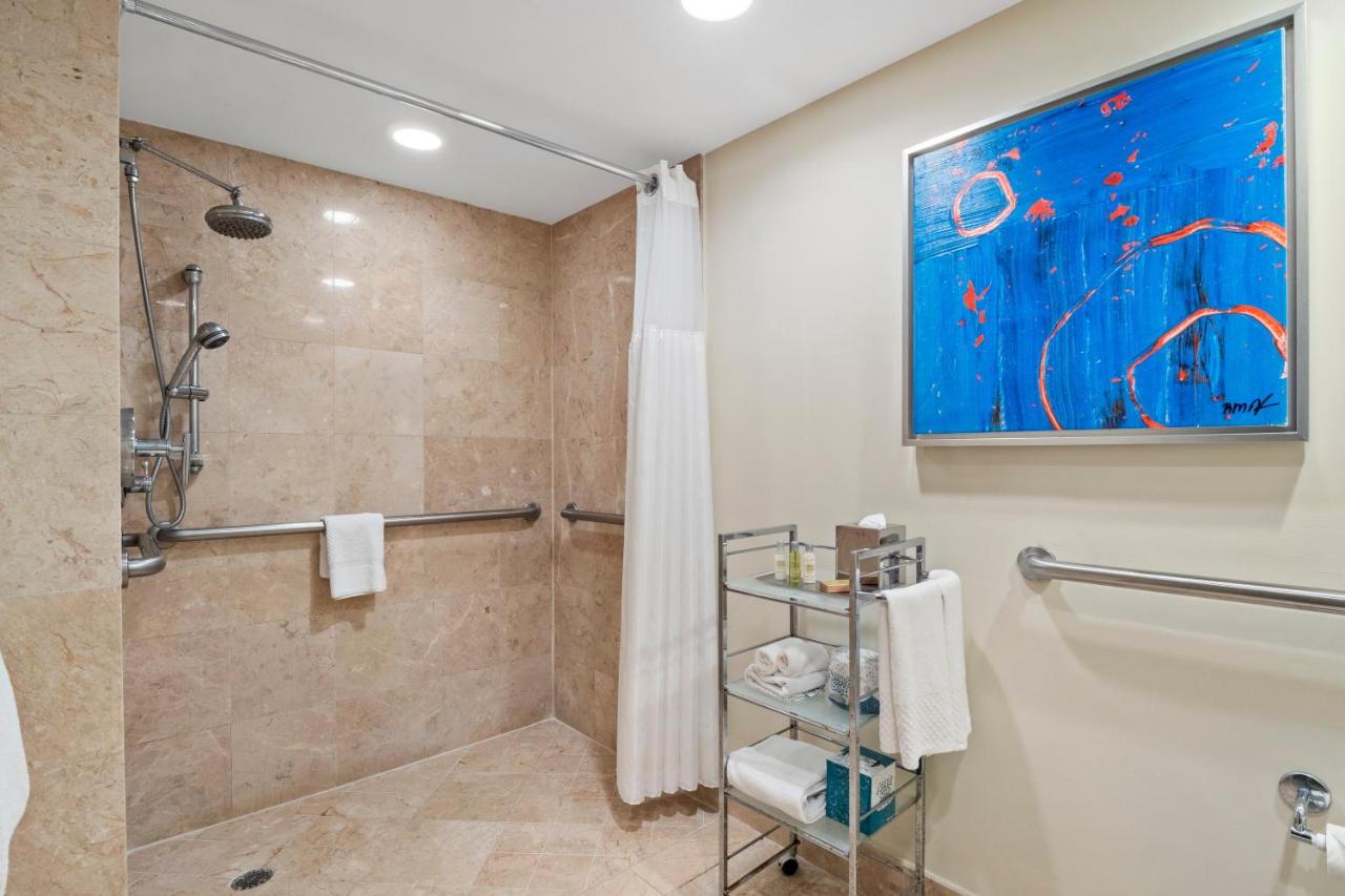 King Suite with Roll in Shower Water View at GALLERYone- A DoubleTree Suites by Hilton Hotel
