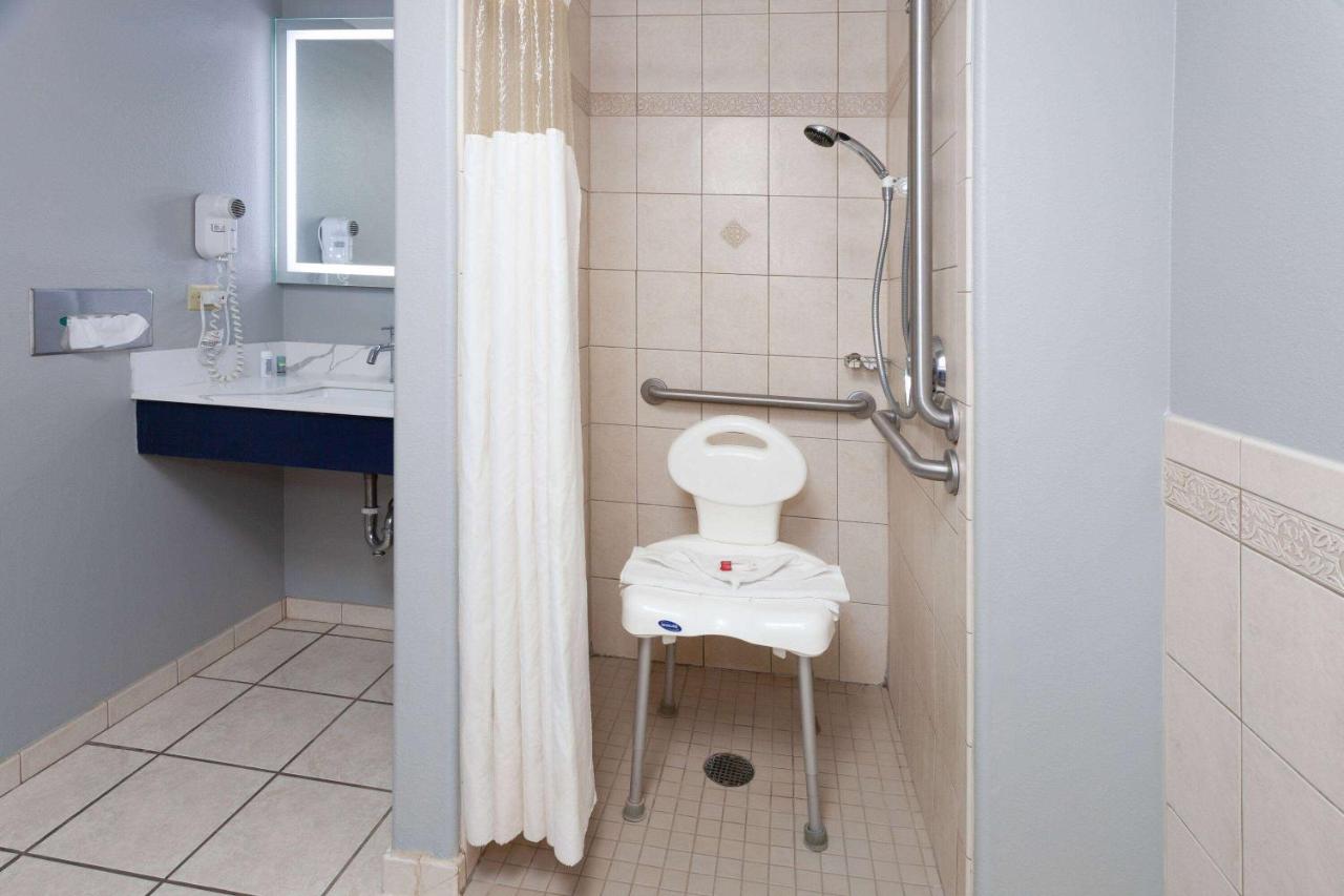 King Room with Roll-in Shower - Mobility Access/Non-Smoking at AmericInn by Wyndham Peoria