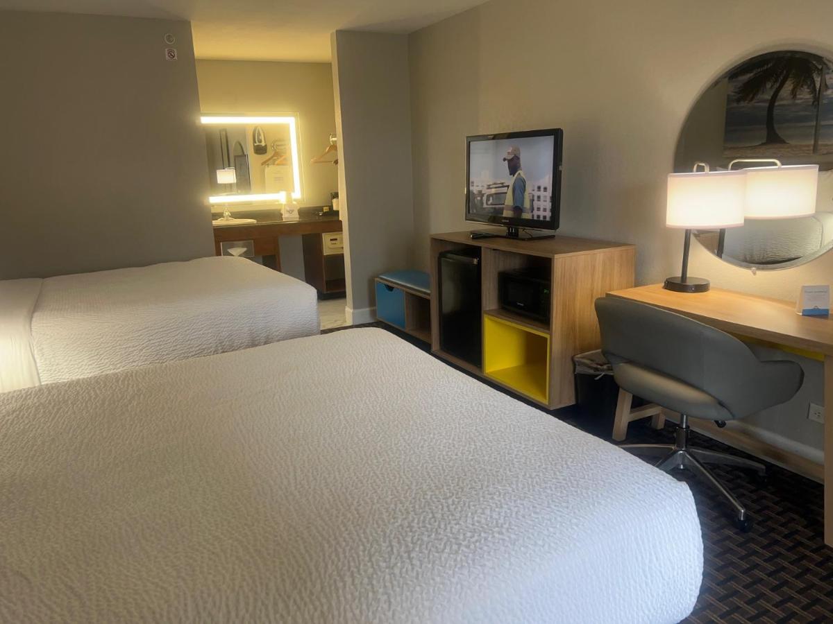 Deluxe Business Queen Room with Two Queen Beds - Non-Smoking at Days Inn by Wyndham Port Charlotte/Punta Gorda