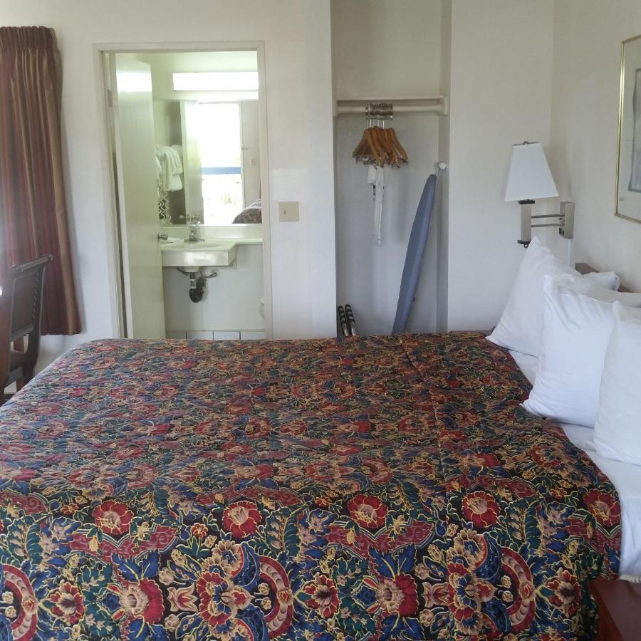 Deluxe King Suite at Days Inn by Wyndham Orange Anaheim