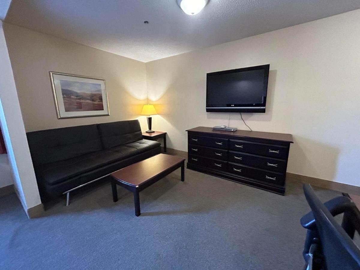 Deluxe King Room with Sofa Bed at Ashley Quarters Hotel Cincinnati Airport