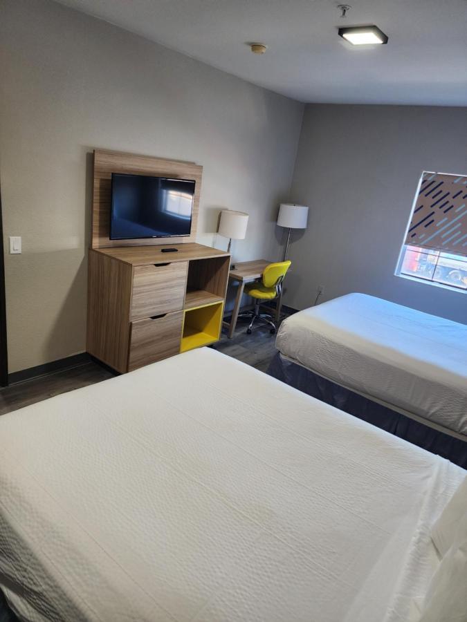 Suite One Bedroom with Three Queen Beds - Non-Smoking at Days Inn & Suites by Wyndham Tucson/Marana