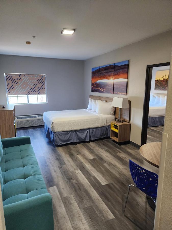 Suite One Bedroom with Three Queen Beds - Non-Smoking at Days Inn & Suites by Wyndham Tucson/Marana