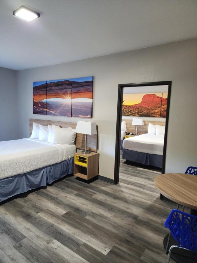 Suite One Bedroom with Three Queen Beds - Non-Smoking at Days Inn & Suites by Wyndham Tucson/Marana