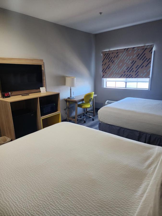 Queen Room with Two Queen Beds - Non-Smoking at Days Inn & Suites by Wyndham Tucson/Marana