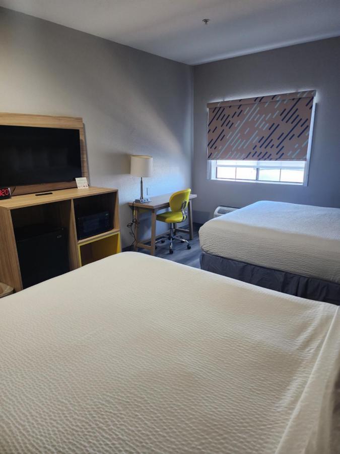 Queen Room with Two Queen Beds - Non-Smoking at Days Inn & Suites by Wyndham Tucson/Marana