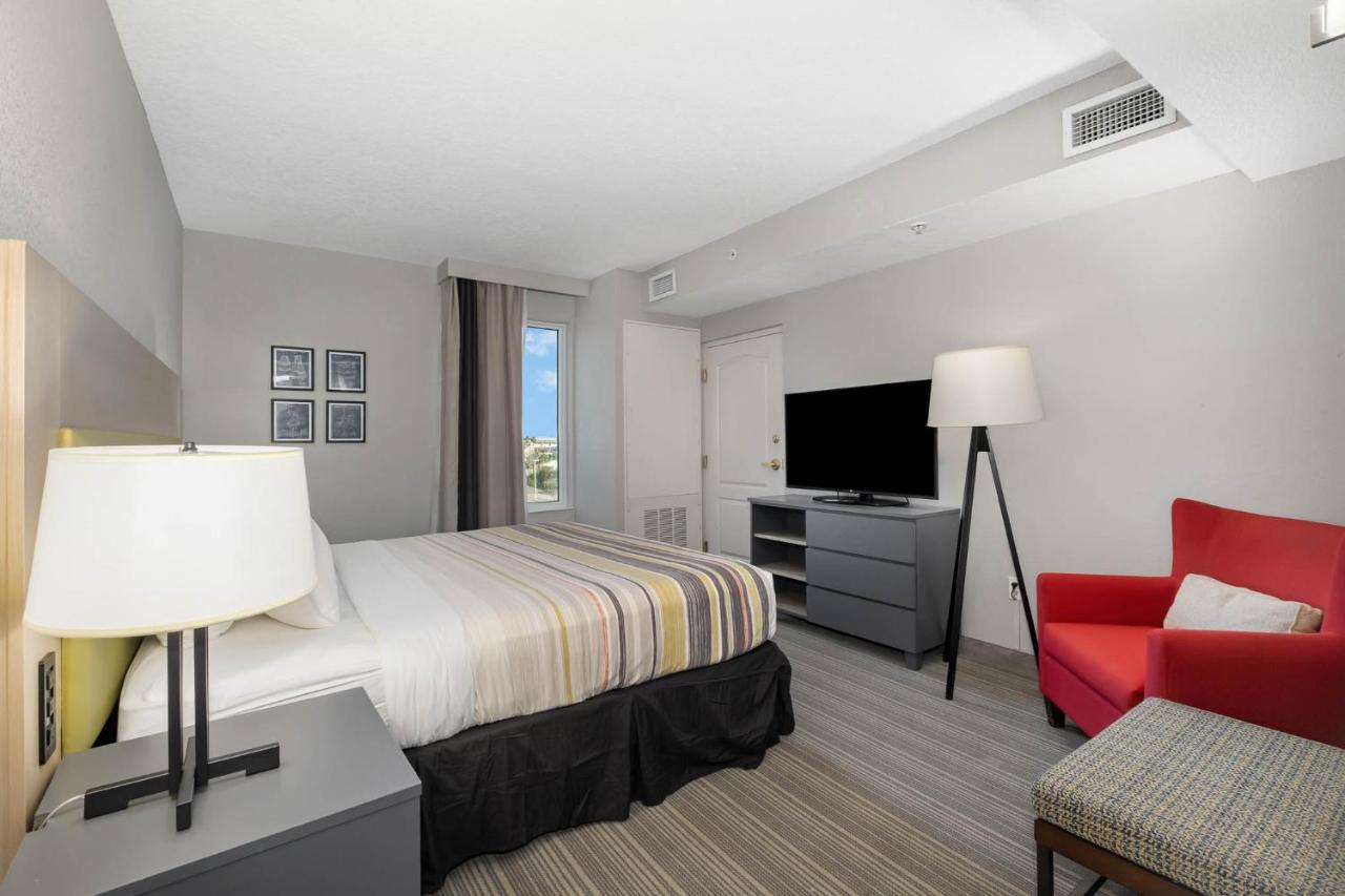 Two-Bedroom Suite with One King Bed and Two Queen Beds - Non-Smoking at Country Inn & Suites by Radisson, Port Canaveral, FL