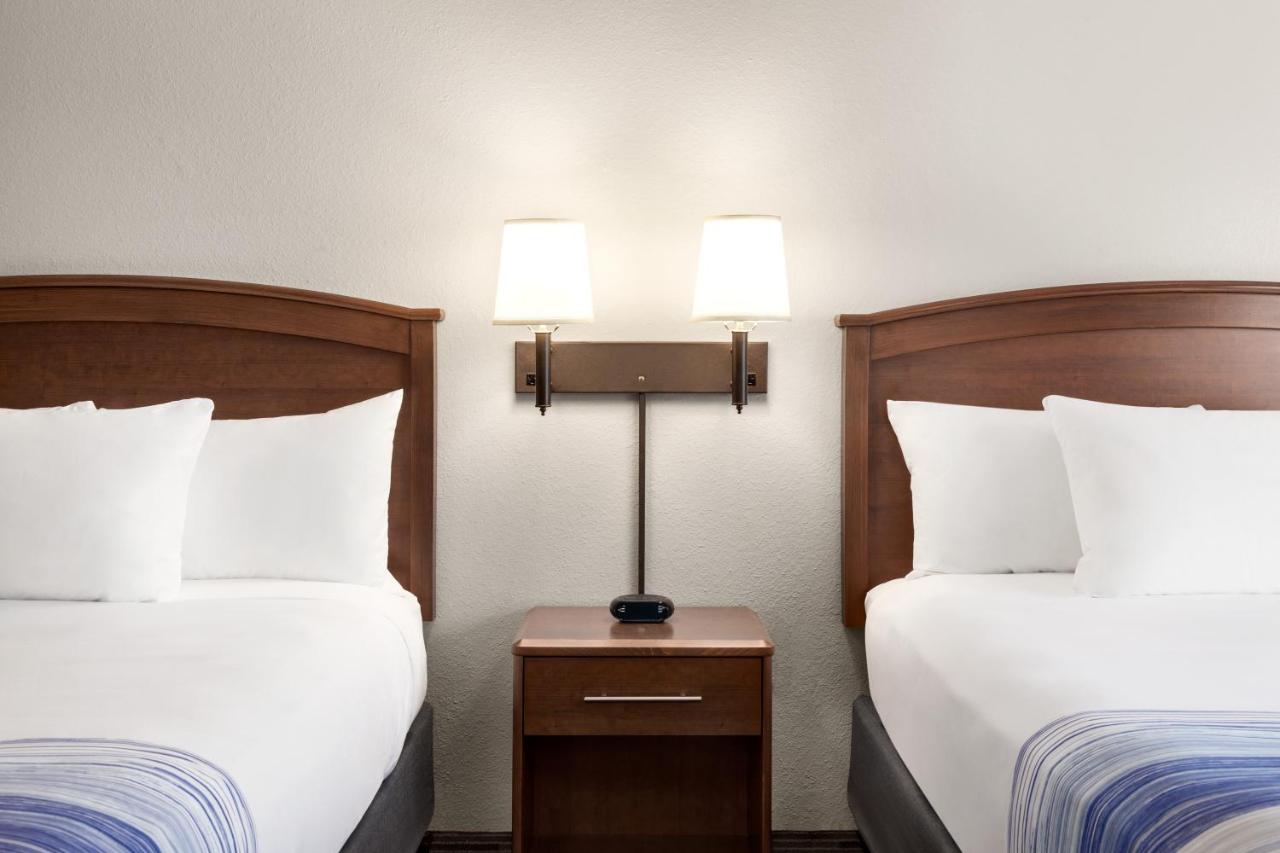 Queen Room with Two Queen Beds - Mobility Access/Non-Smoking at AmericInn by Wyndham Fergus Falls - Conference Center