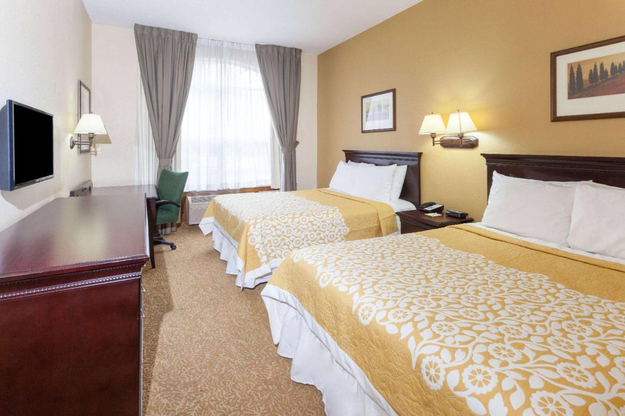 Queen Room with Two Queen Beds - Non-Smoking at Days Inn & Suites by Wyndham Tucker/Northlake