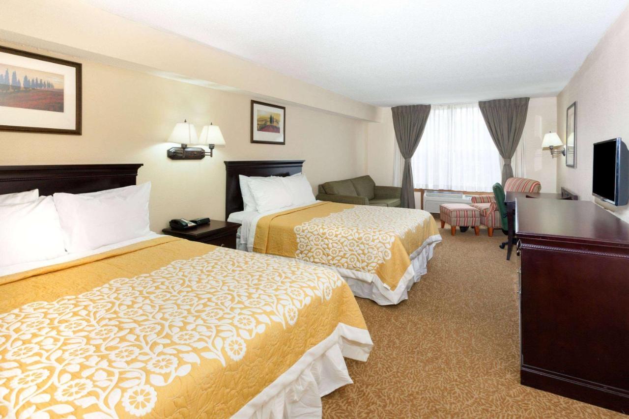 Deluxe Queen Room with Two Queen Beds - Non-Smoking at Days Inn & Suites by Wyndham Tucker/Northlake
