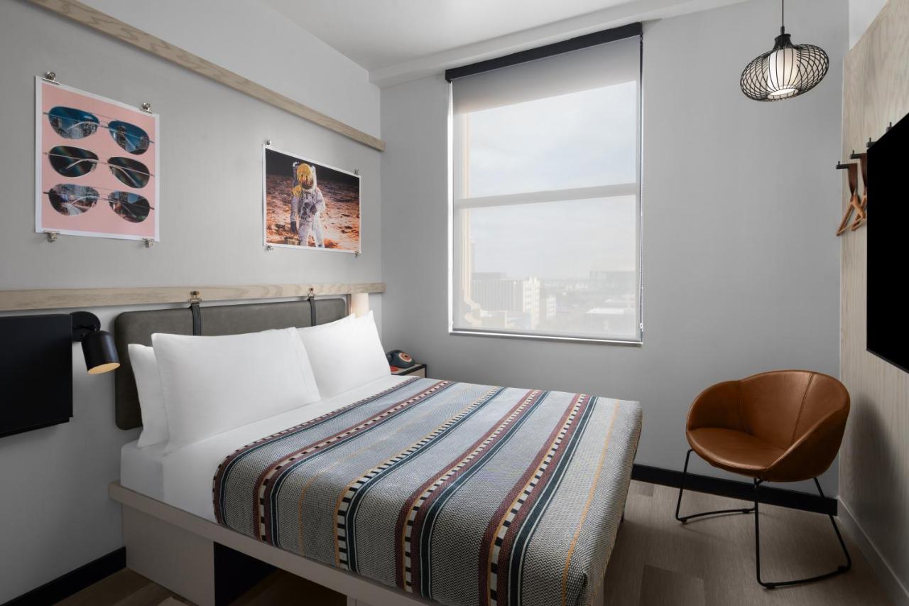 Queen Room with City View at Moxy Houston Downtown
