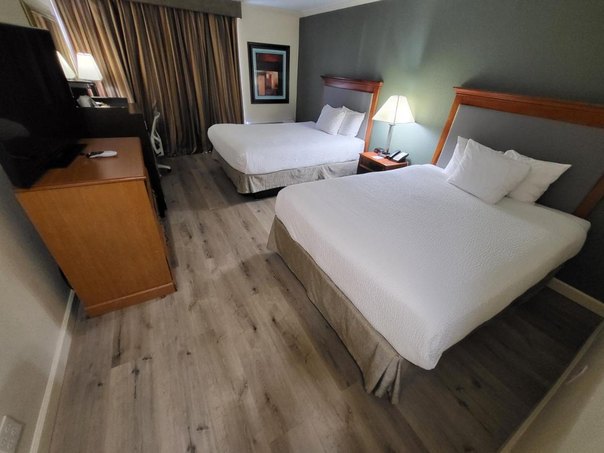Queen Room with Two Queen Beds - Non-Smoking at Ramada by Wyndham Houston Intercontinental Airport East
