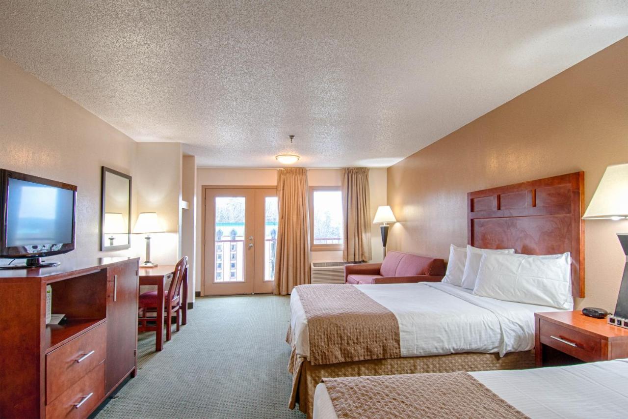 Queen Room with Two Queen Beds and Kitchenette at Park Tower Inn