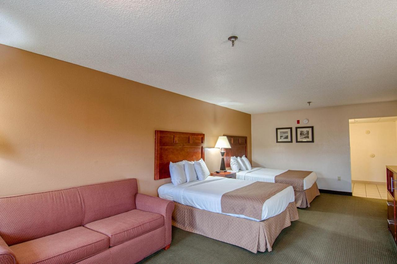 Queen Room with Two Queen Beds and Sleeper Sofa at Park Tower Inn