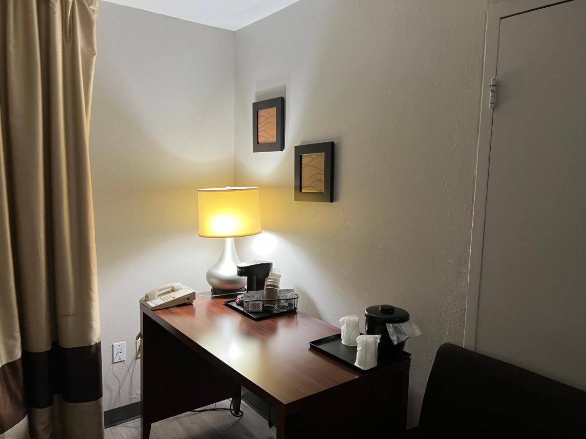 Queen Room with Two Queen Beds and Roll-In Shower - Non-Smoking at Country Inn & Suites By Radisson, Battle Creek, MI