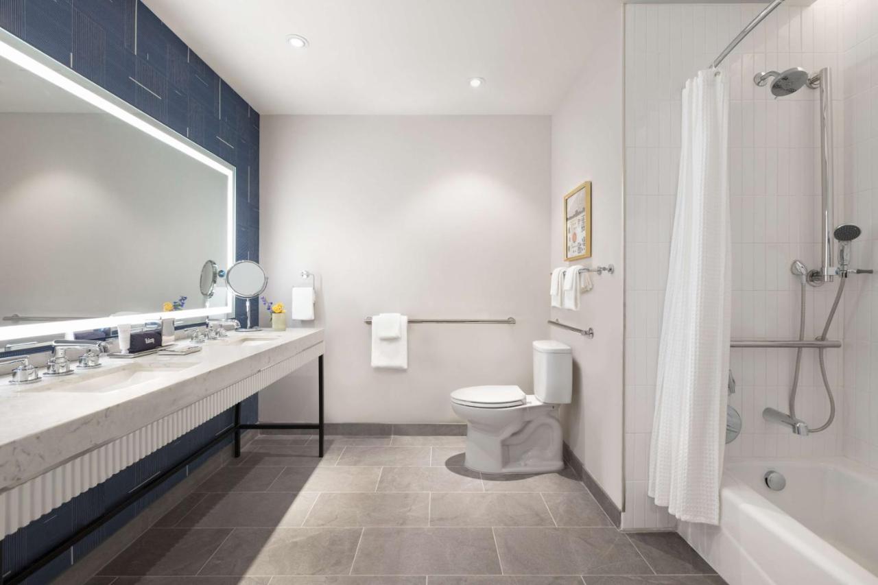 Queen Room with Two Queen Beds and Tub - Mobility/Hearing Access at 106 Jefferson Huntsville, Curio Collection by Hilton