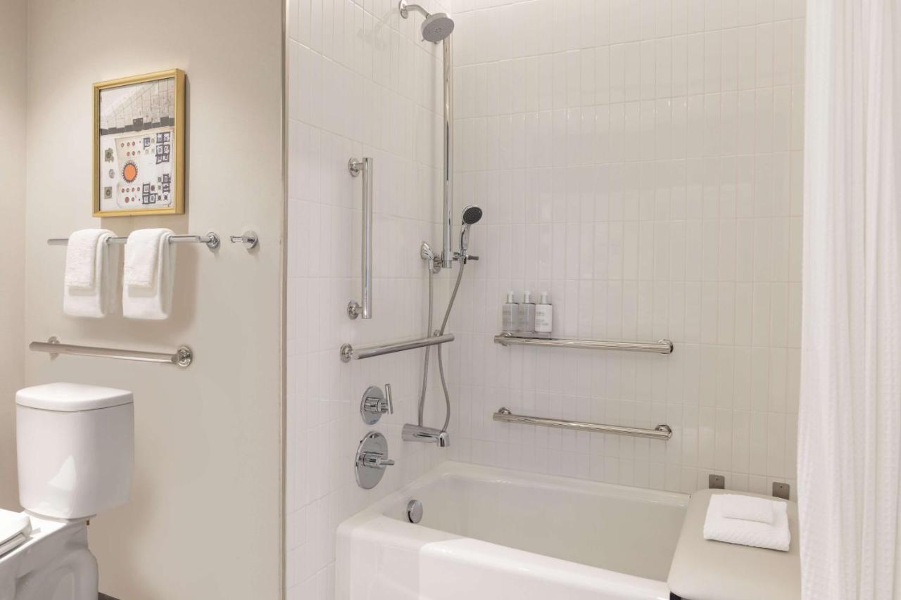 Queen Room with Two Queen Beds and Tub - Mobility/Hearing Access at 106 Jefferson Huntsville, Curio Collection by Hilton