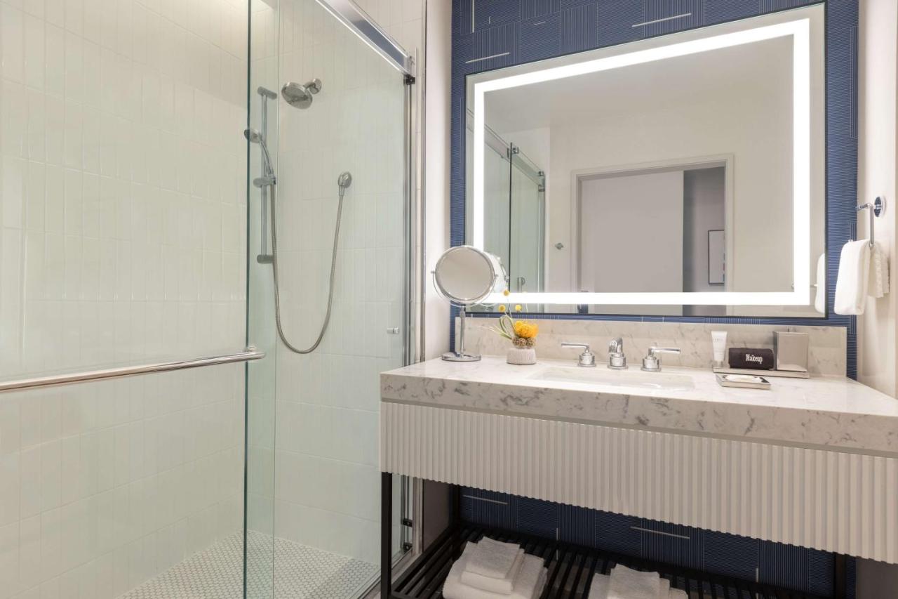 Deluxe King Room at 106 Jefferson Huntsville, Curio Collection by Hilton