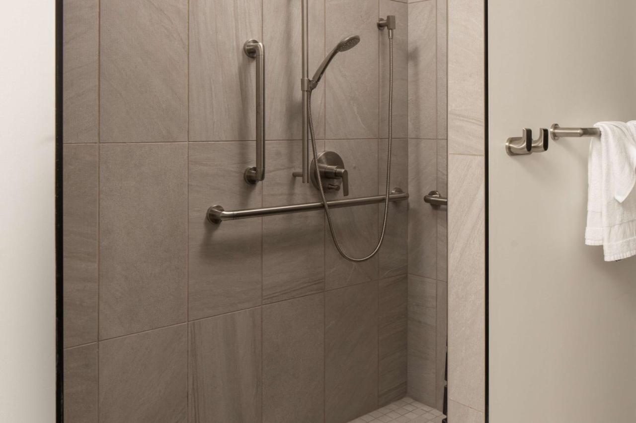 Deluxe Queen Room with Two Queen Beds with Roll-In Shower and Water View - Mobility Accessible at Hotel Marcel New Haven, Tapestry Collection By Hilton