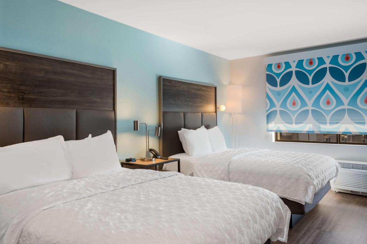 Queen Room with Two Queen Beds and Walk In Shower at Tru by Hilton Greensboro, NC
