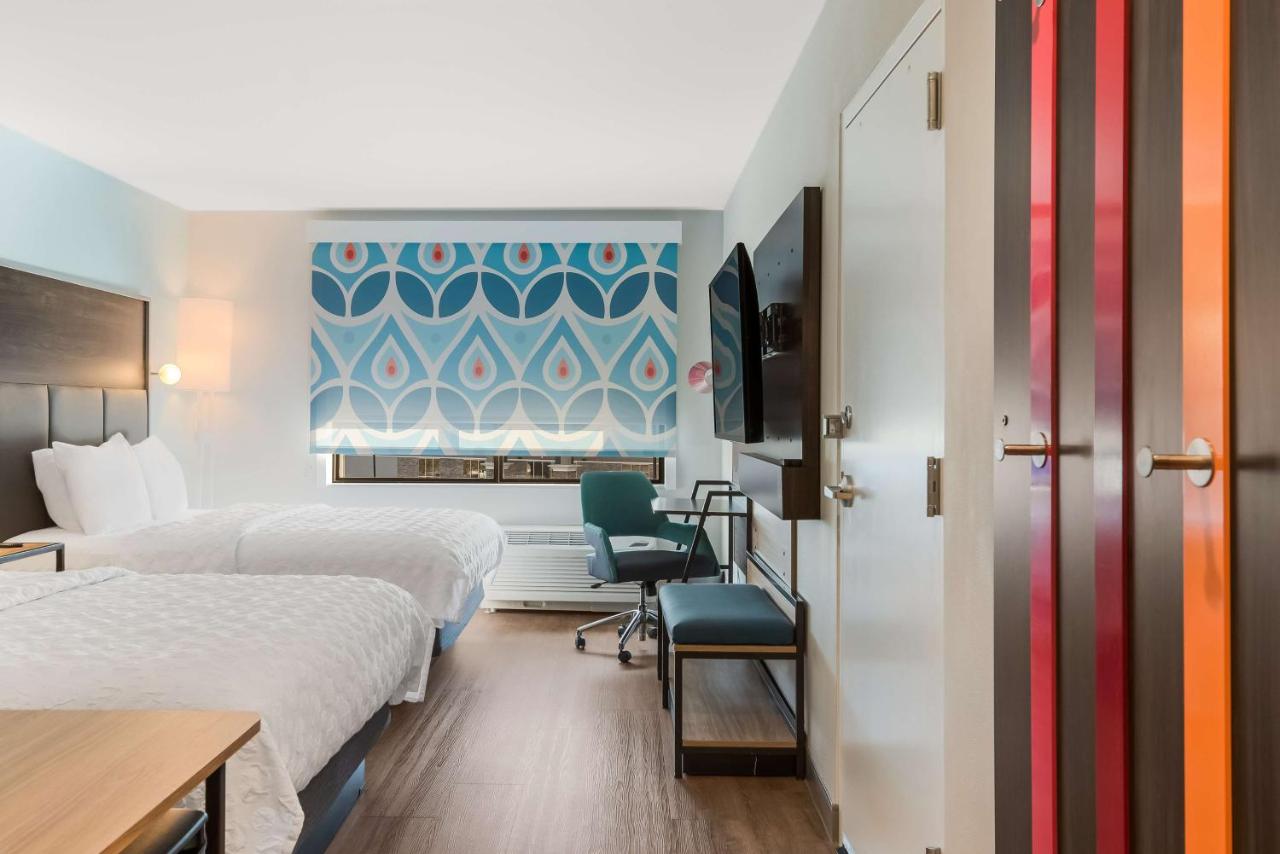 Queen Room with Two Queen Beds and Walk In Shower at Tru by Hilton Greensboro, NC