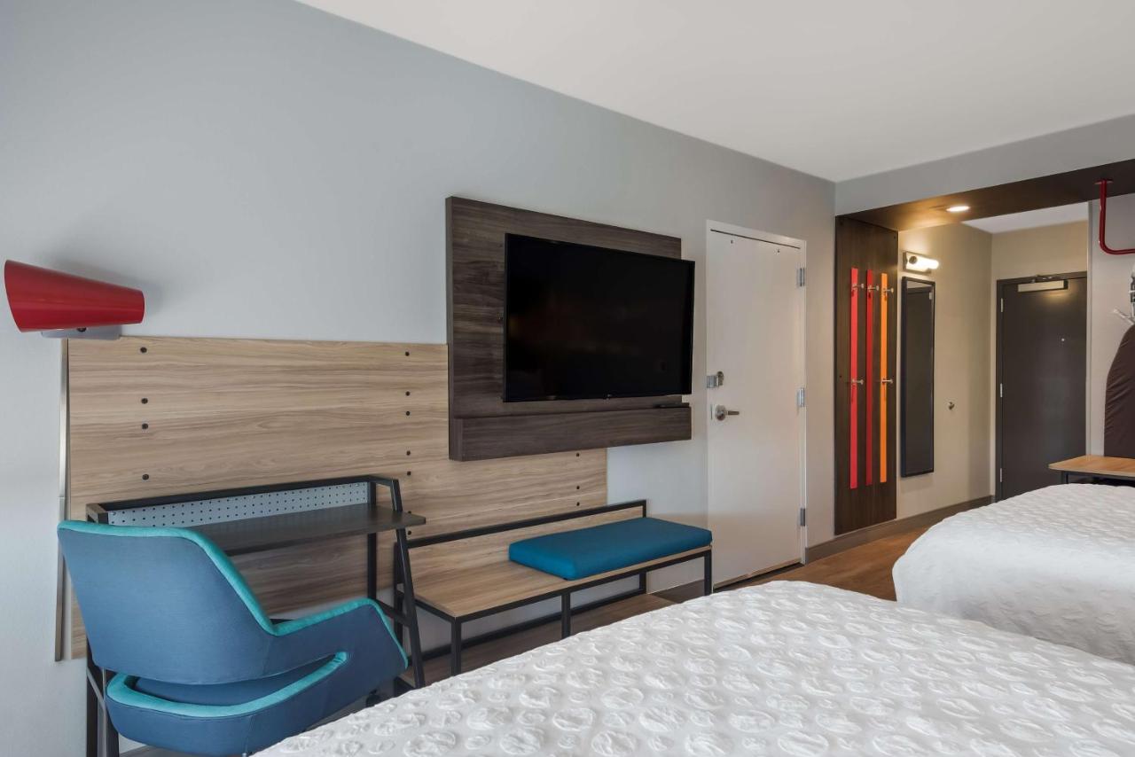 Queen Room with Two Queen Beds and Walk In Shower at Tru by Hilton Greensboro, NC