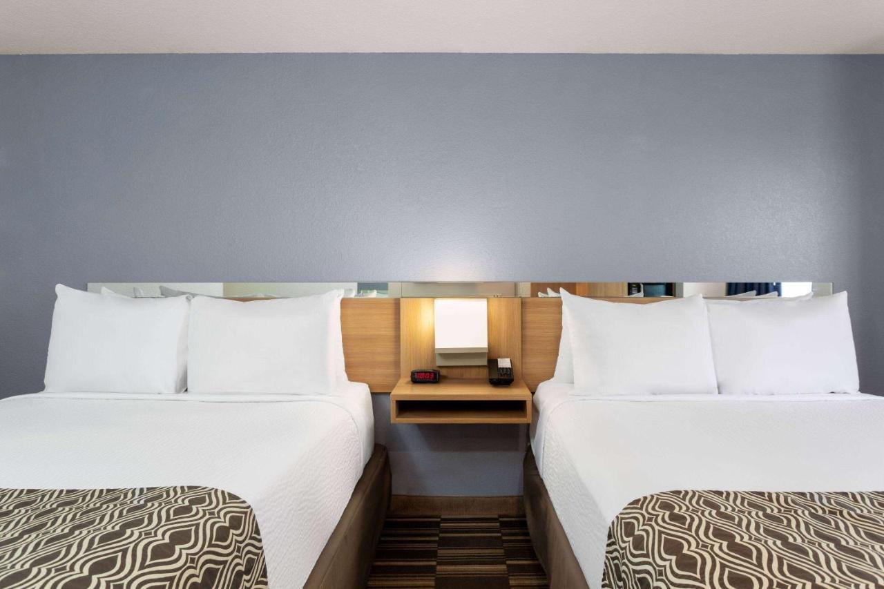 Queen Room with Two Queen Beds - Non-Smoking at Microtel Inn & Suites by Wyndham Zephyrhills
