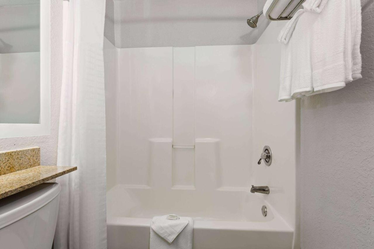 Queen Room with Two Queen Beds - Non-Smoking at Microtel Inn & Suites by Wyndham Zephyrhills