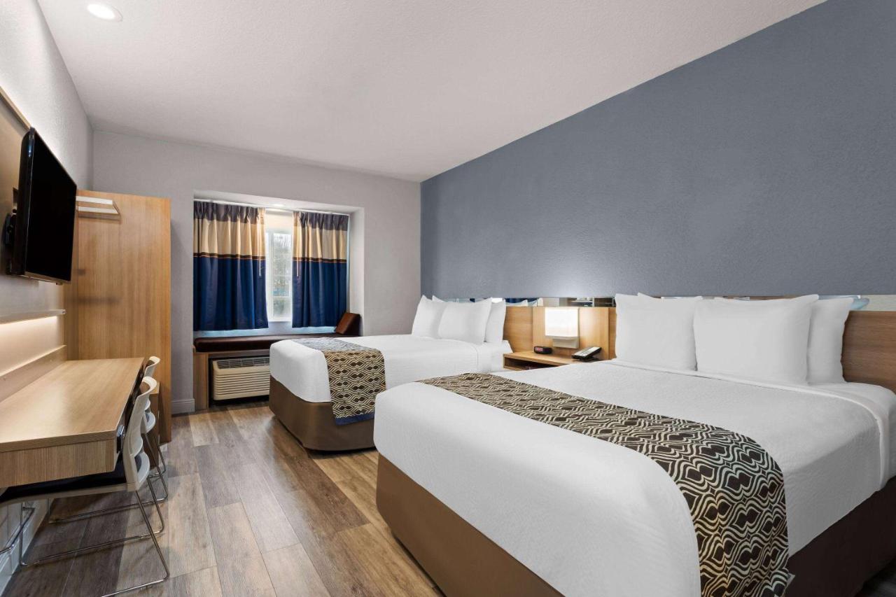 Queen Room with Two Queen Beds - Non-Smoking at Microtel Inn & Suites by Wyndham Zephyrhills
