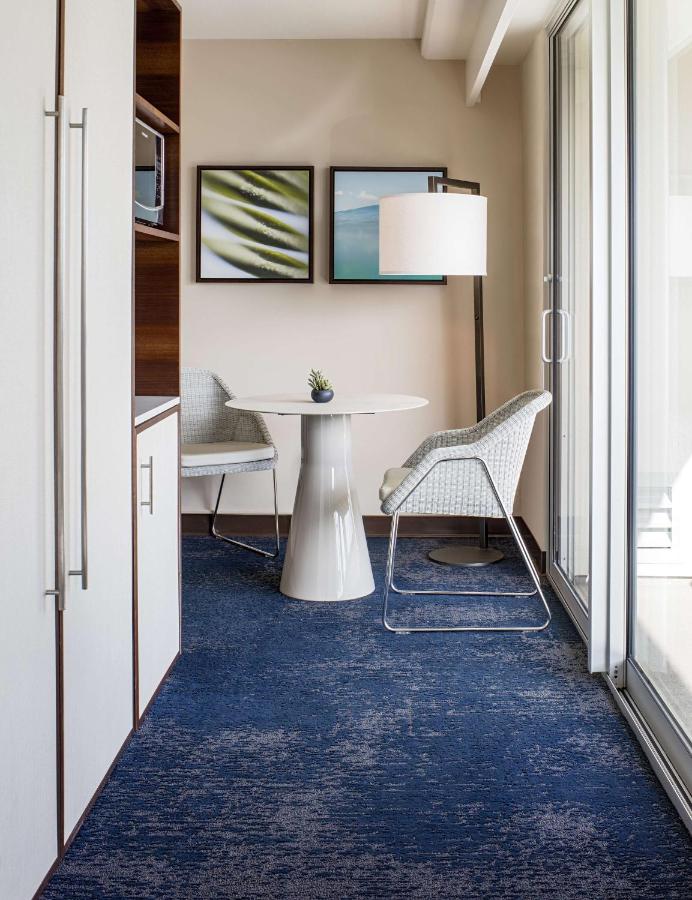 Suite with Two Double Beds and One Sofa Bed with Partial Ocean View at Hilton Garden Inn Waikiki Beach