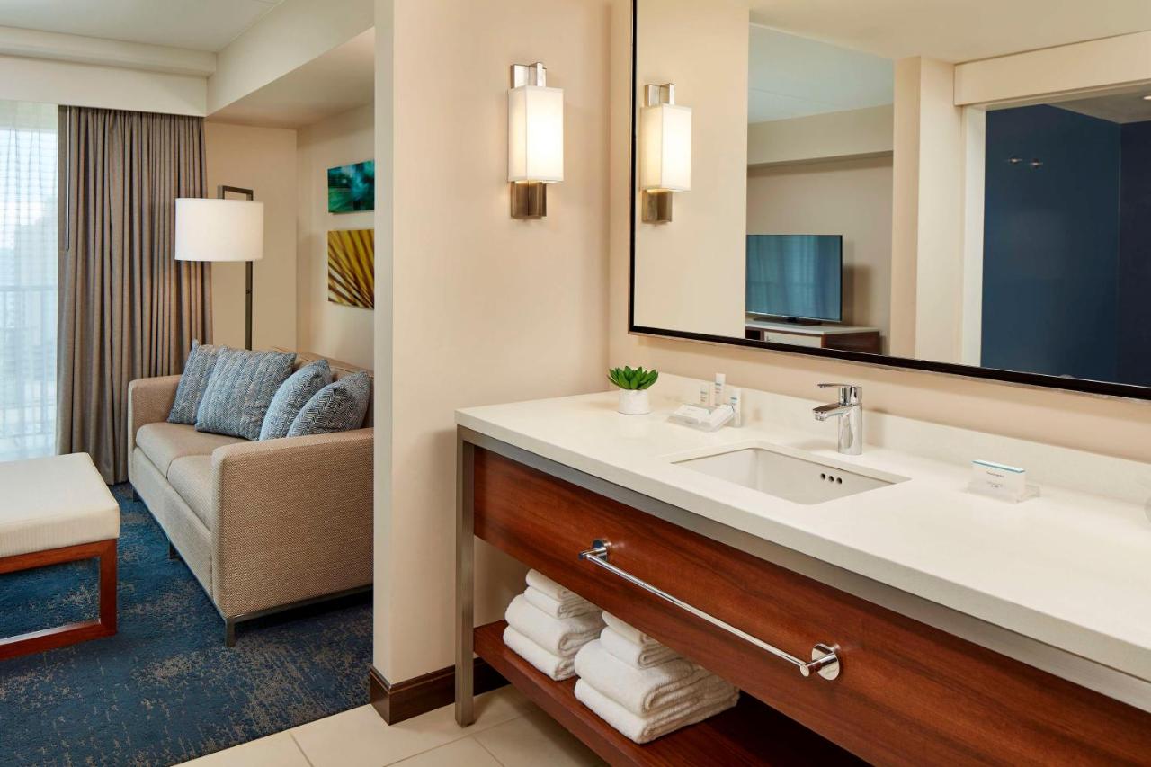 Suite with Two Double Beds and One Sofa Bed with Partial Ocean View at Hilton Garden Inn Waikiki Beach