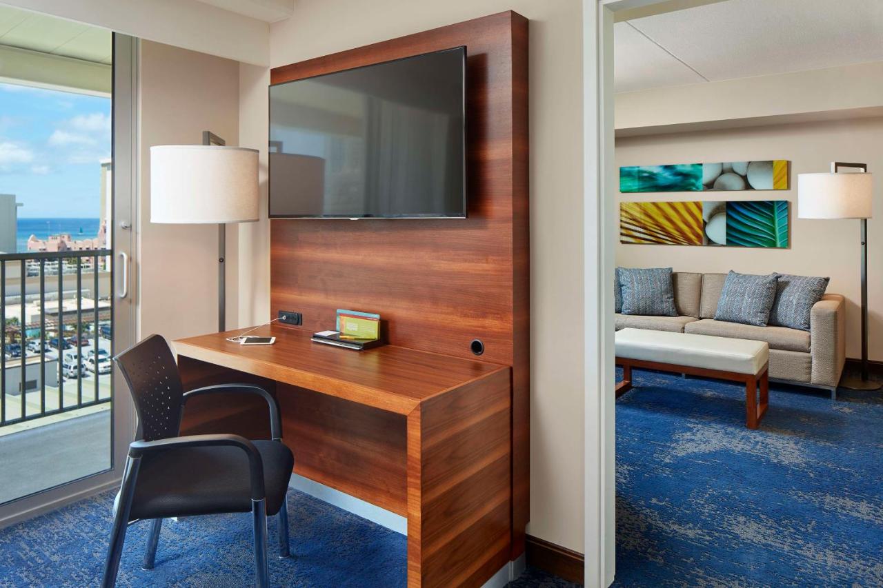 Suite with Two Double Beds and One Sofa Bed with Partial Ocean View at Hilton Garden Inn Waikiki Beach