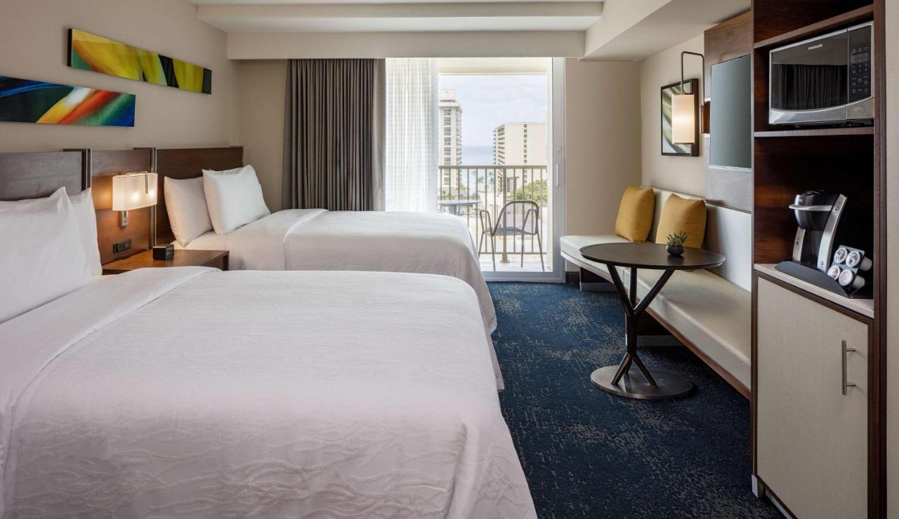 Room with Two Double Beds - Hearing Access with Partial Ocean View at Hilton Garden Inn Waikiki Beach