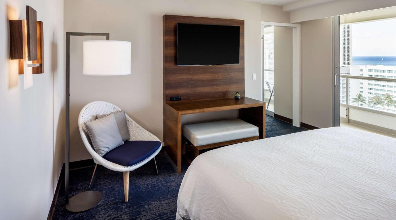 Suite with Two Double Beds and One Sofa Bed with Partial Ocean View at Hilton Garden Inn Waikiki Beach