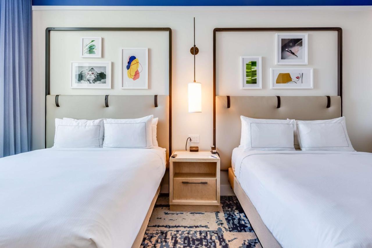 Queen Room with Two Queen Beds at SERENA Hotel Aventura Miami, Tapestry Collection by Hilton