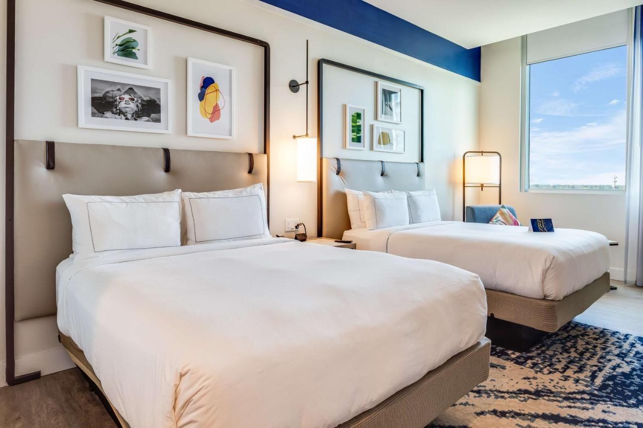 Queen Room with Two Queen Beds - Mobility Accessible at SERENA Hotel Aventura Miami, Tapestry Collection by Hilton