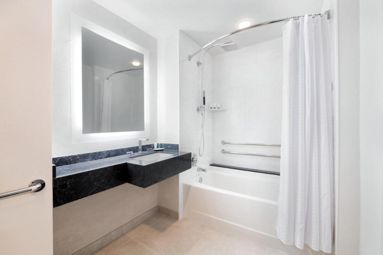 Traditional Queen Room with Two Queen Beds and Adapted Tub - Mobility and Hearing Accessible at The Westin Dallas Stonebriar Golf Resort & Spa