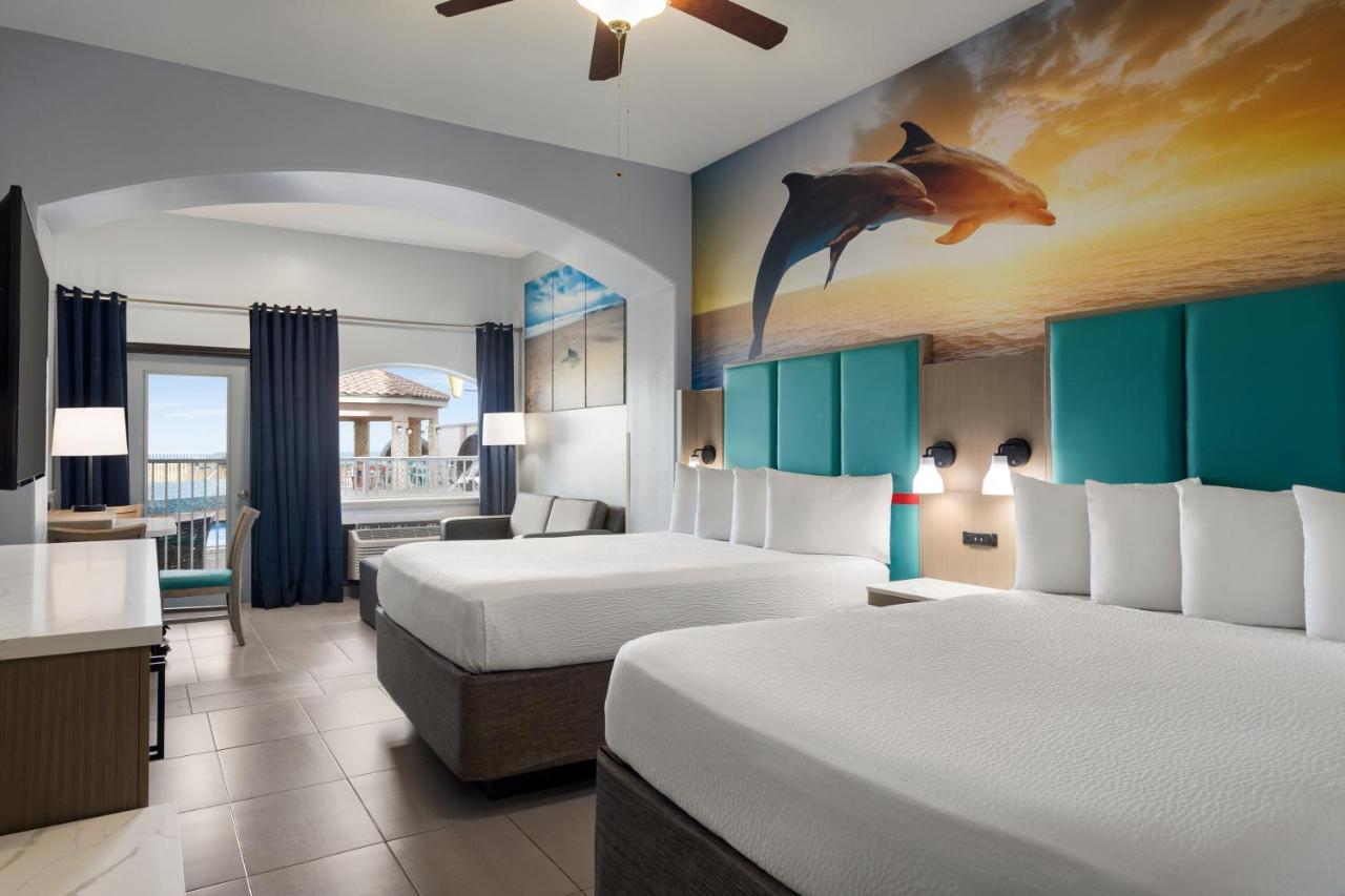 Queen Room with Two Queen Beds and Sofa Bed - Pool View at La Copa Inn Beach Hotel