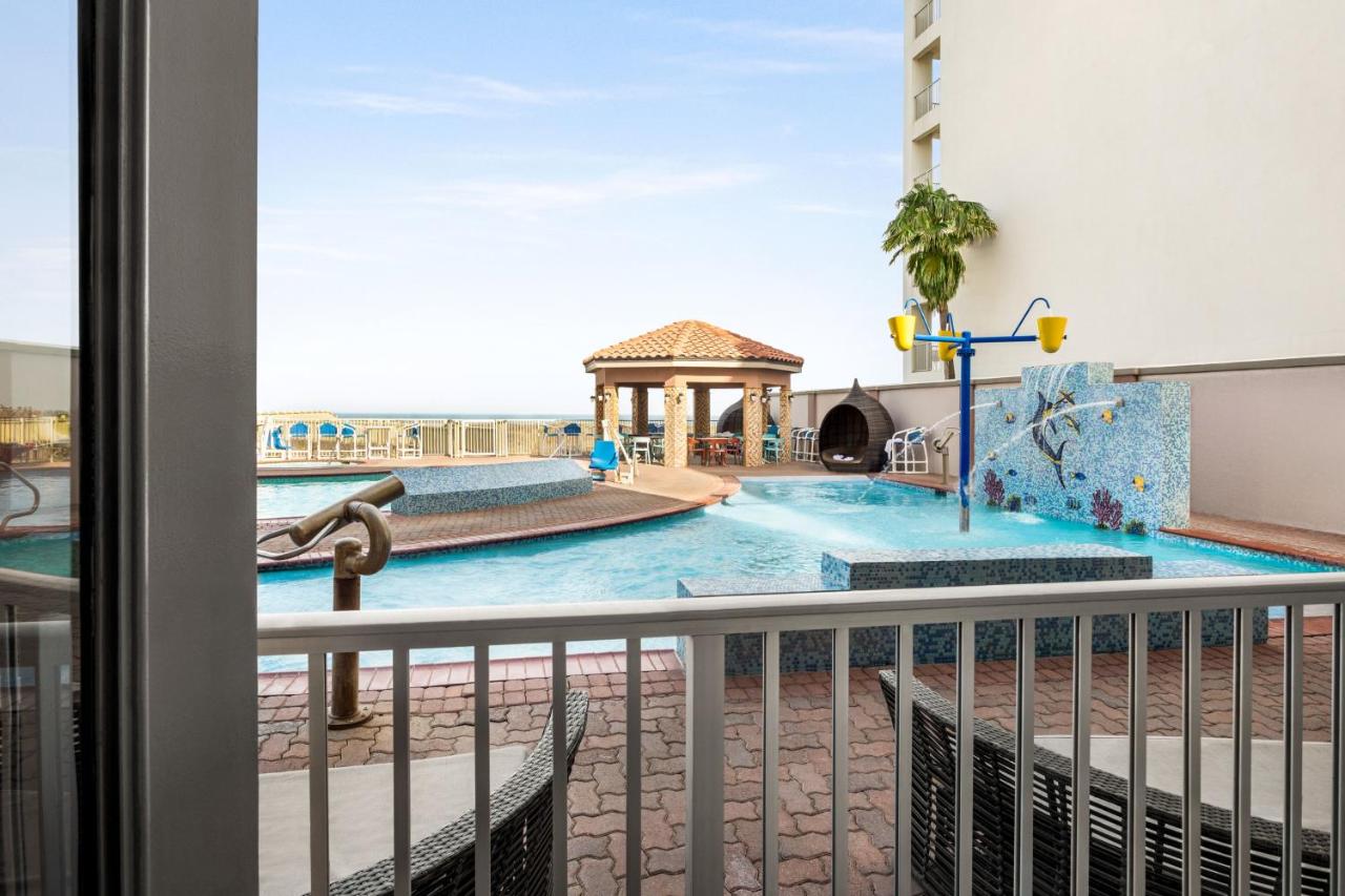 Queen Room with Two Queen Beds and Sofa Bed - Pool View at La Copa Inn Beach Hotel
