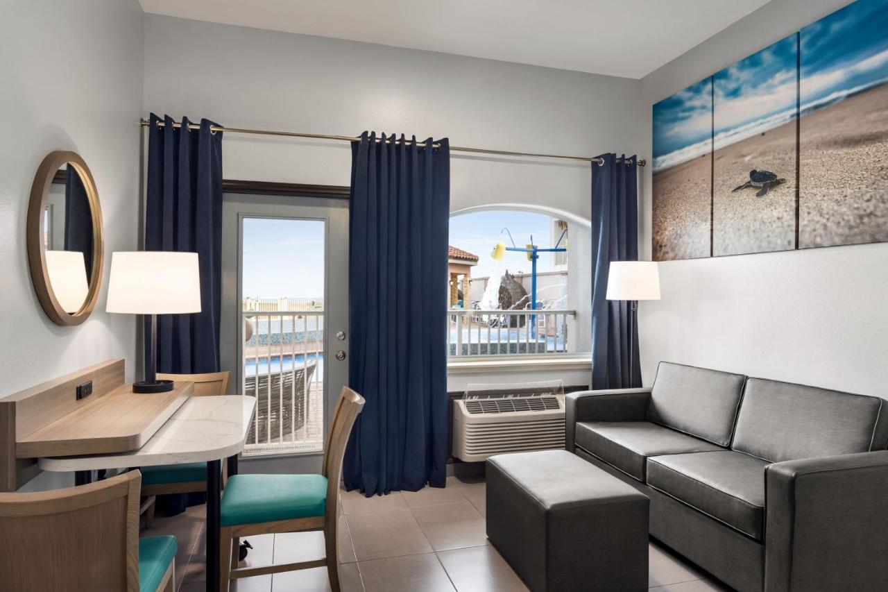 Queen Room with Two Queen Beds and Sofa Bed - Pool View at La Copa Inn Beach Hotel