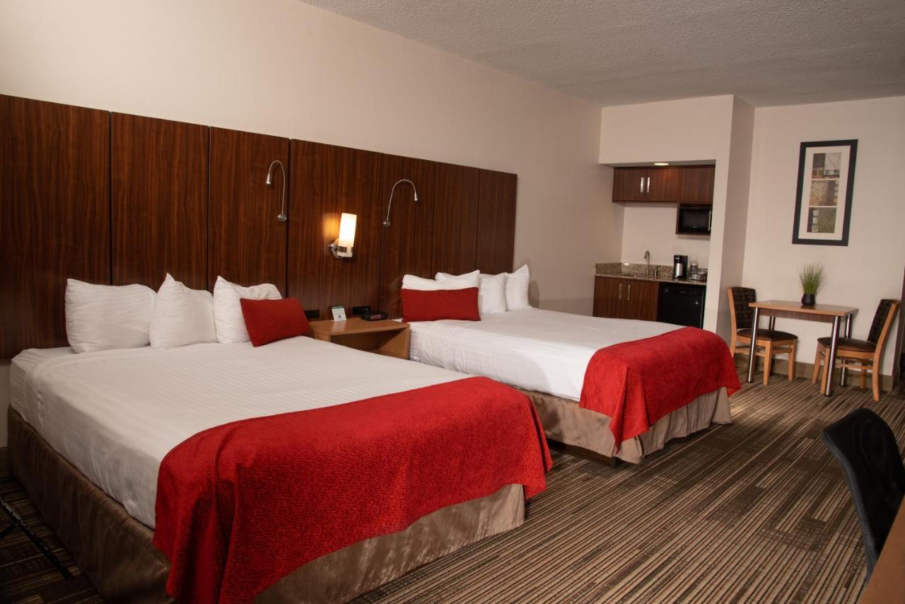 Double Queen Room with Roll in Shower at Northfield Inn, Suites & Conference Center