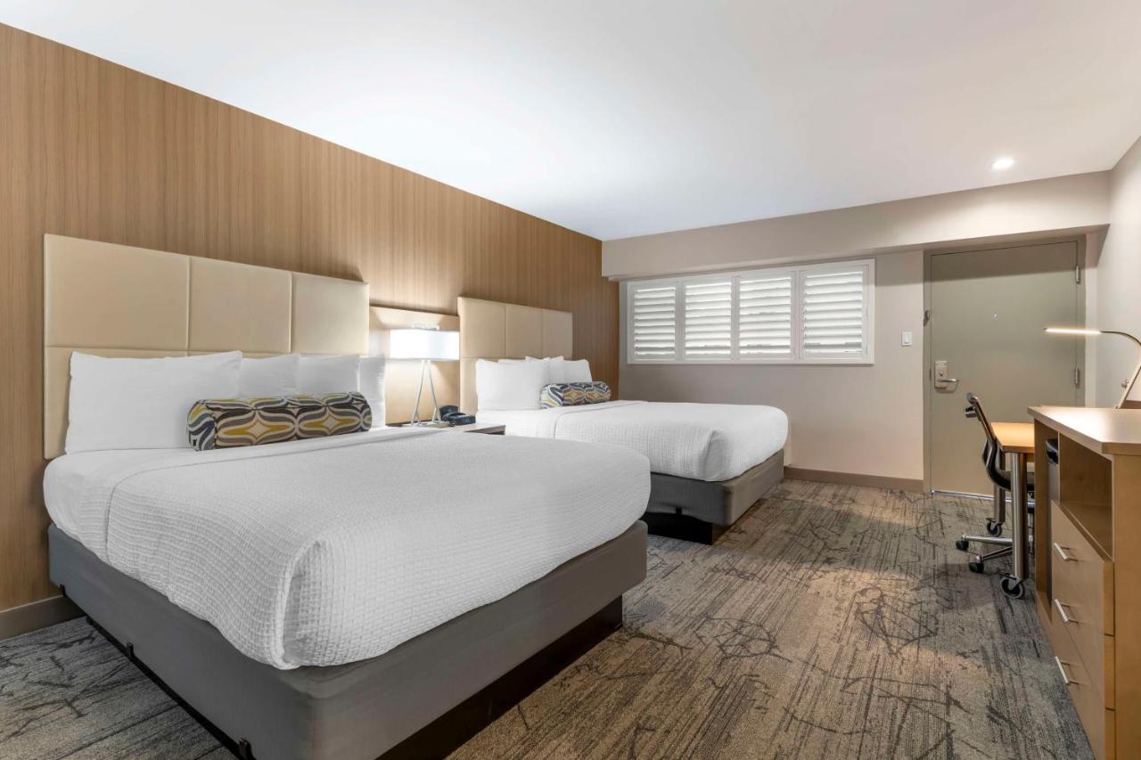 Queen Room with Two Queen Beds at Best Western Red Coach Inn