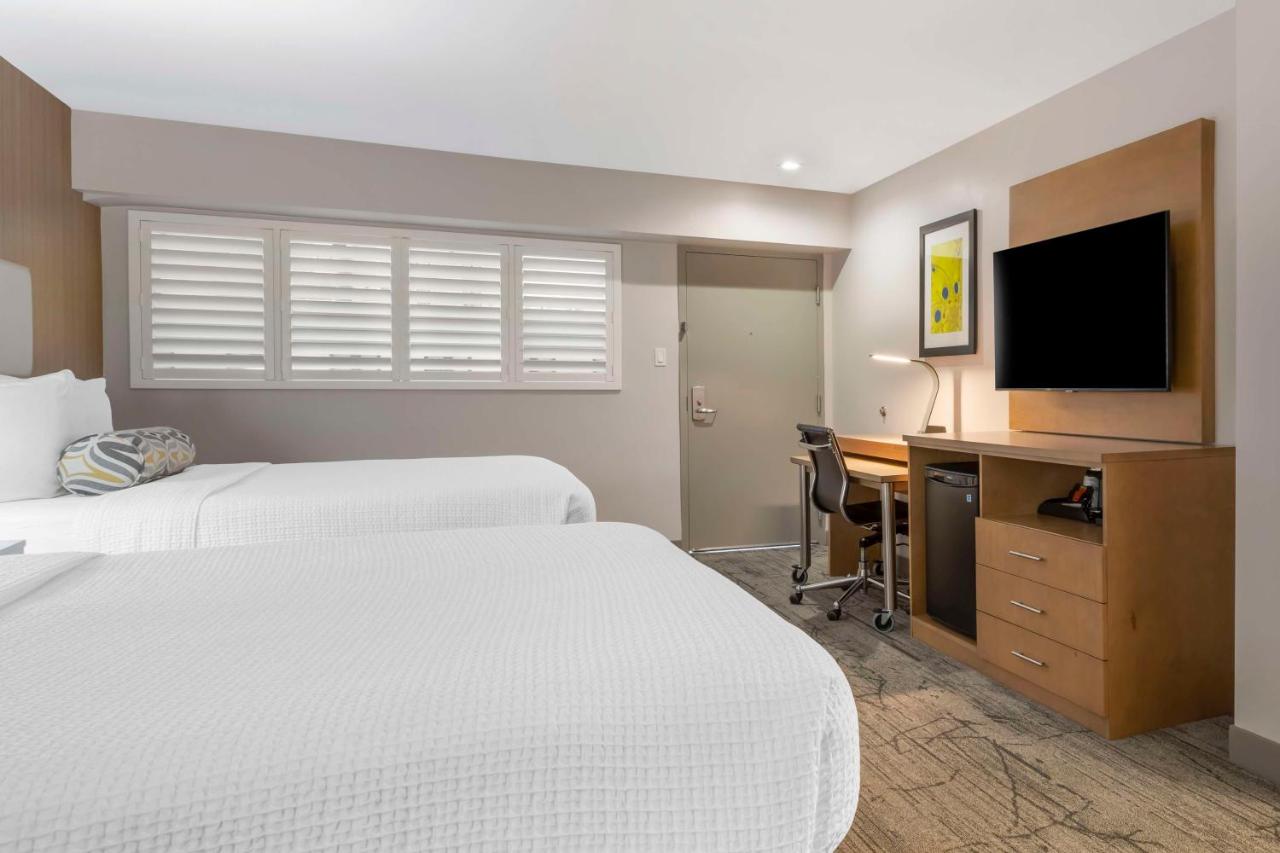 Queen Room with Two Queen Beds at Best Western Red Coach Inn