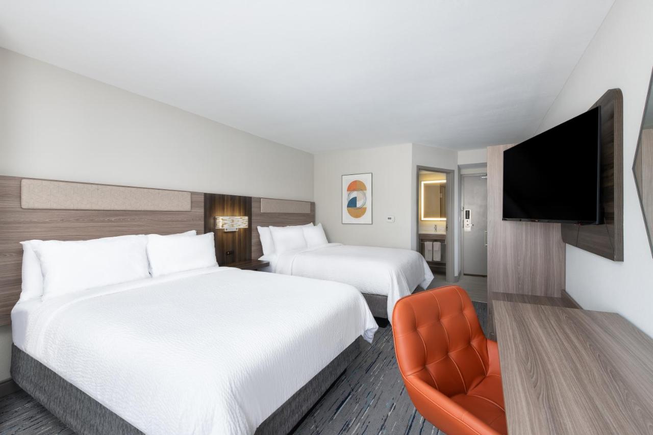 Queen Room with Two Queen Beds - Hearing Accessible/Non-Smoking at Holiday Inn Express Atlanta West - Theme Park Area by IHG