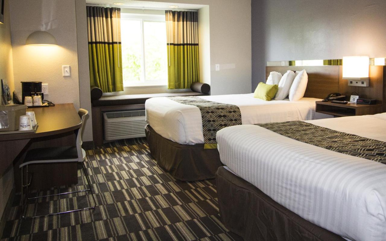 Queen Room with Two Queen Beds - Non-Smoking at Microtel Inn by Wyndham Victor/Rochester