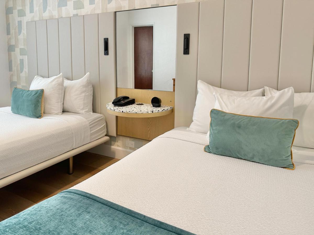 Classic Two Double Beds at Avalon Hotel
