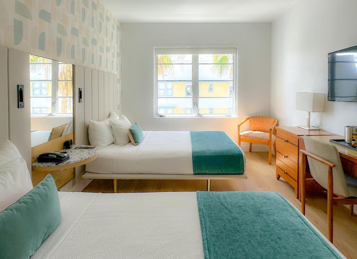 Partial Ocean View Two Double Beds at Avalon Hotel